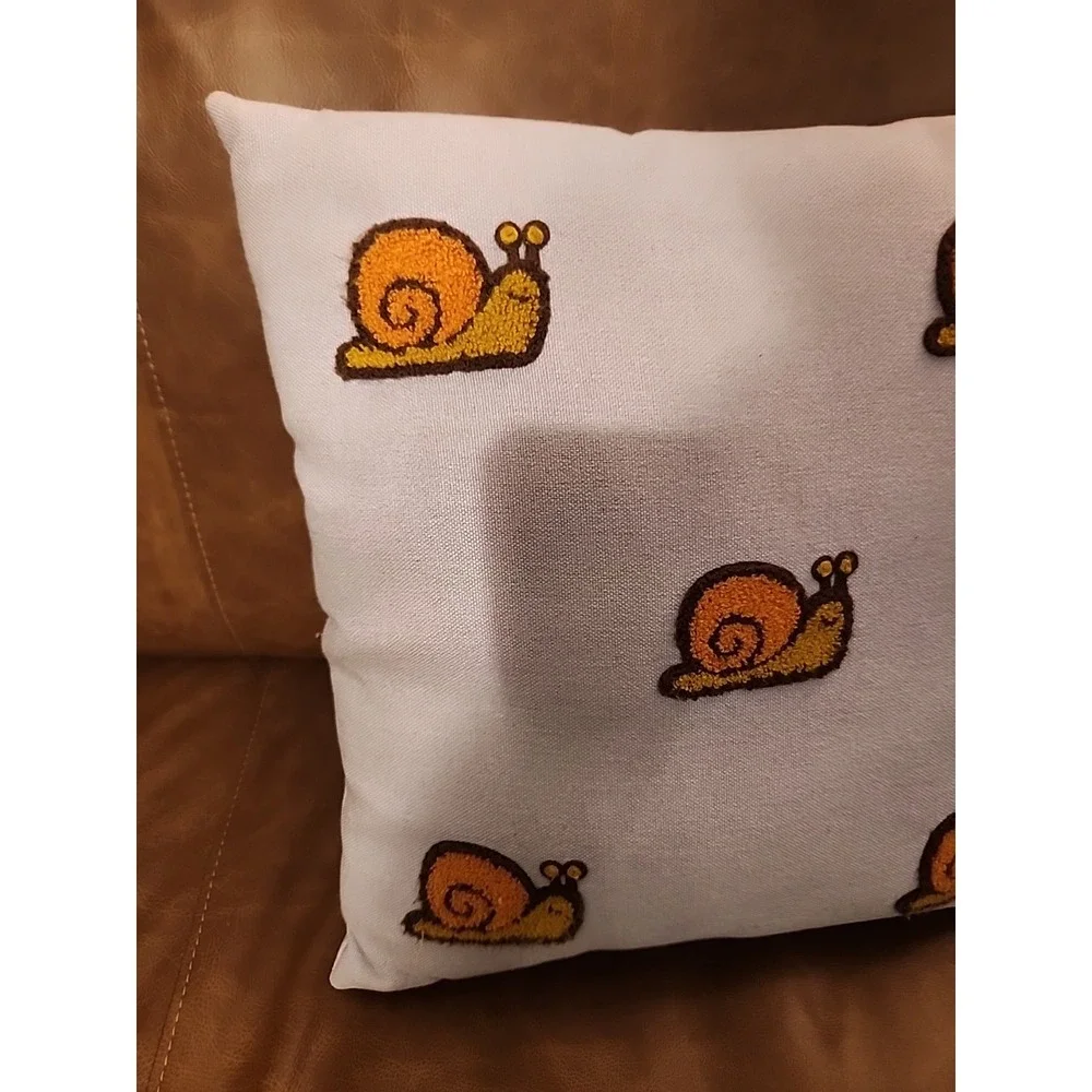 Luxe Collection Decorative Snail Pillow 16x16x3‎
